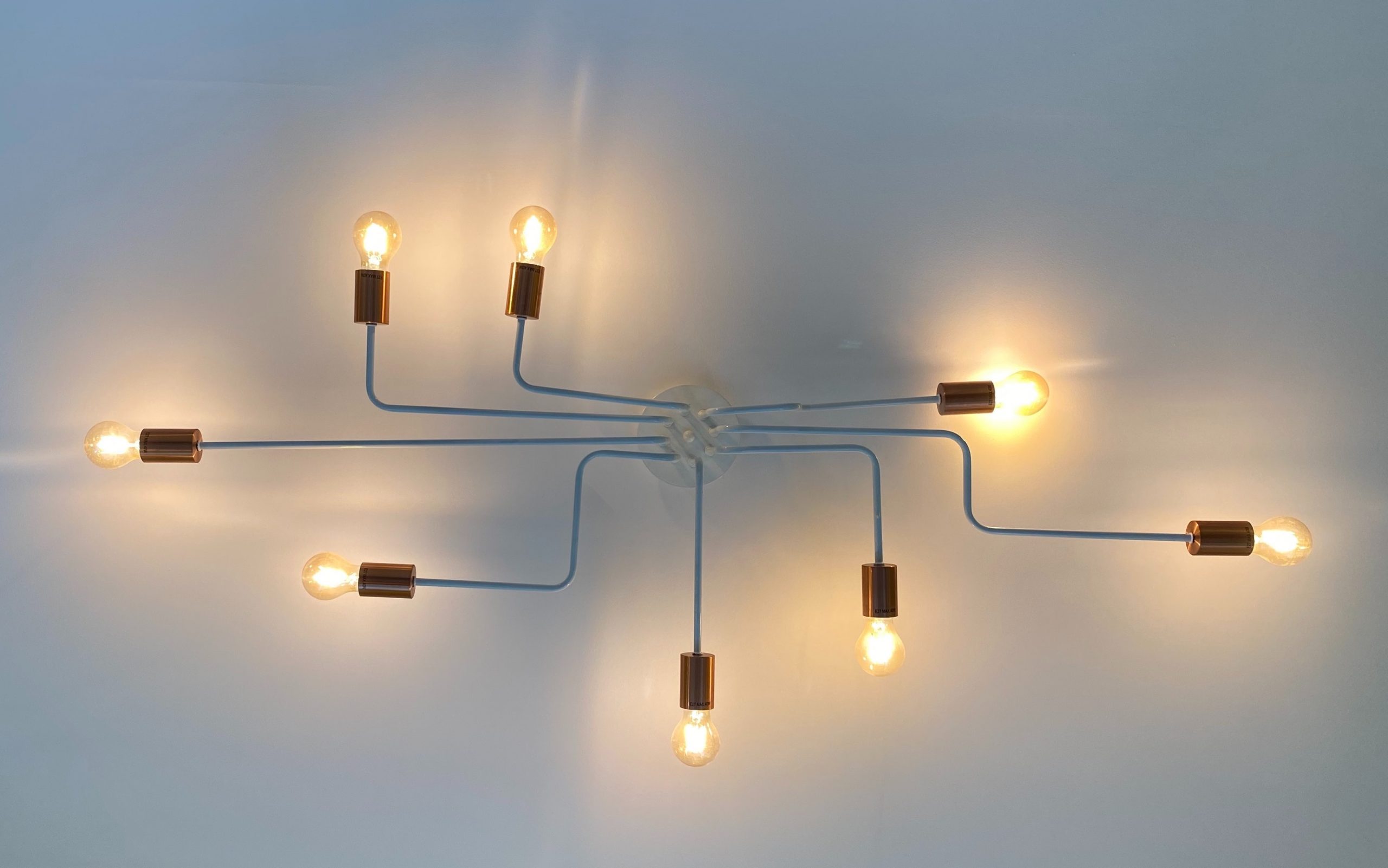 Image of several lightbulbs connected together